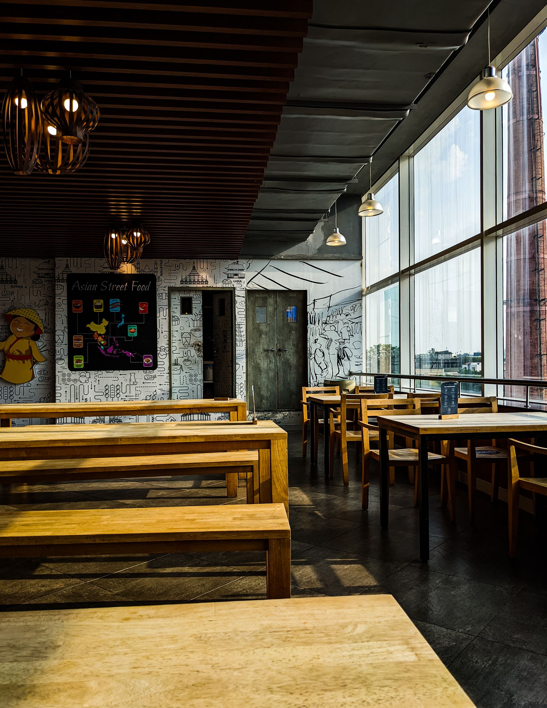 Empty dining room with wooden furniture