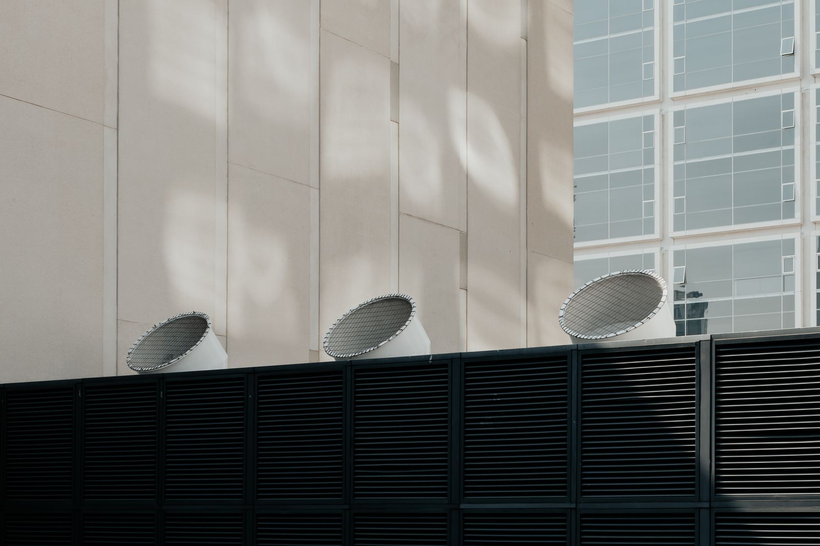 Exterior ventilation outlets on a modern building